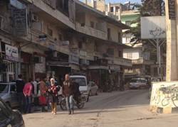 Syrian town takes strife in stride